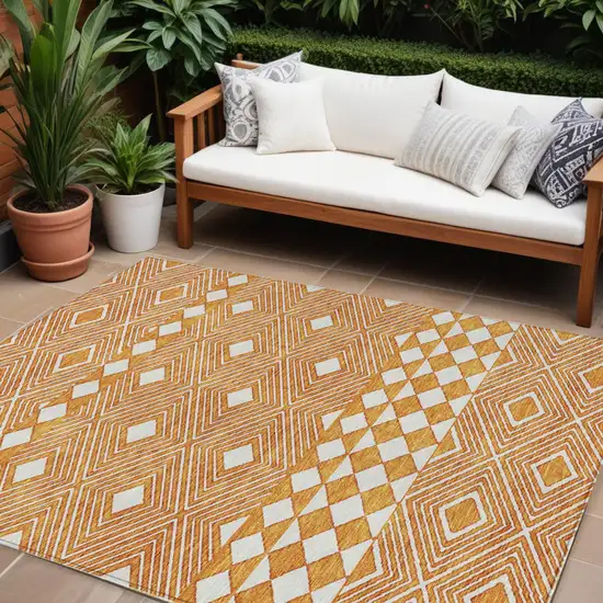 Orange And Ivory Geometric Washable Indoor Outdoor Area Rug Photo 1