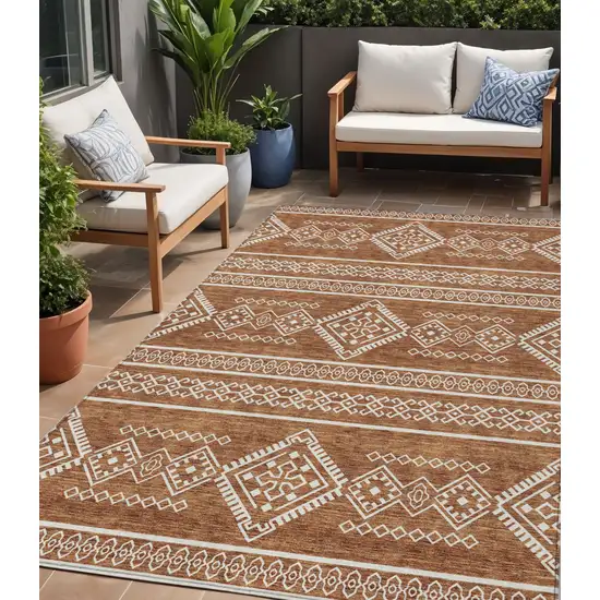 Orange And Ivory Southwestern Washable Indoor Outdoor Area Rug Photo 1