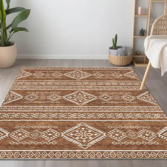 Orange And Ivory Southwestern Washable Indoor Outdoor Area Rug Photo 9