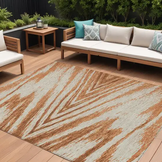 Orange Brown And Beige Abstract Washable Indoor Outdoor Area Rug Photo 1