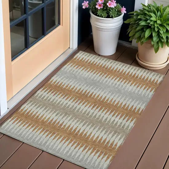 Orange Gray And Beige Striped Washable Indoor Outdoor Area Rug Photo 1