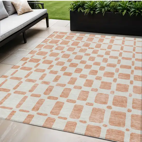 Peach And Beige Geometric Washable Indoor Outdoor Area Rug Photo 1