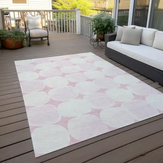 Pink And Ivory Abstract Washable Indoor Outdoor Area Rug Photo 9