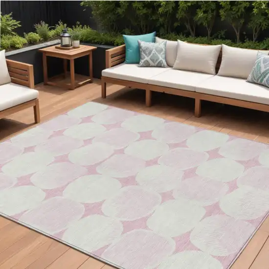 Pink And Ivory Abstract Washable Indoor Outdoor Area Rug Photo 1