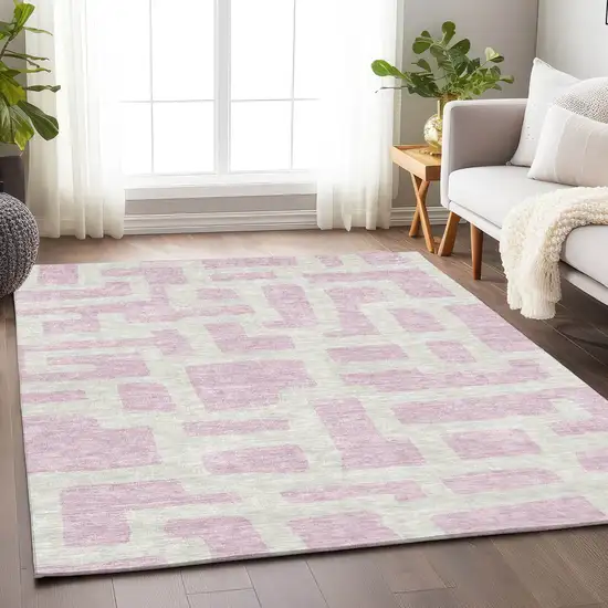 Pink And Ivory Abstract Washable Indoor Outdoor Area Rug Photo 9