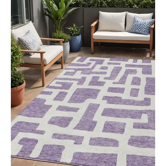 Purple And Ivory Abstract Washable Indoor Outdoor Area Rug Photo 1
