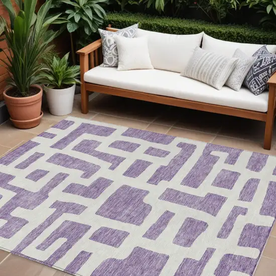 Purple And Ivory Abstract Washable Indoor Outdoor Area Rug Photo 1