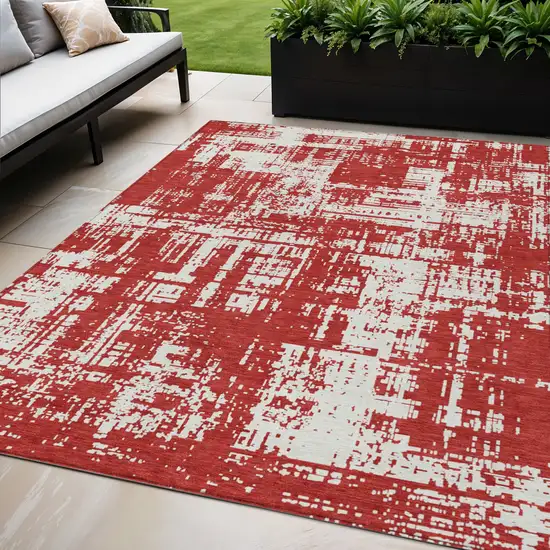 Red And Ivory Abstract Washable Indoor Outdoor Area Rug Photo 1