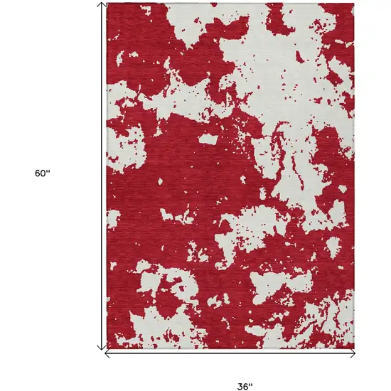 Red And Ivory Abstract Washable Indoor Outdoor Area Rug Photo 3