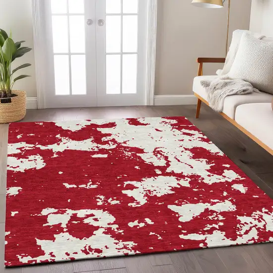 Red And Ivory Abstract Washable Indoor Outdoor Area Rug Photo 9