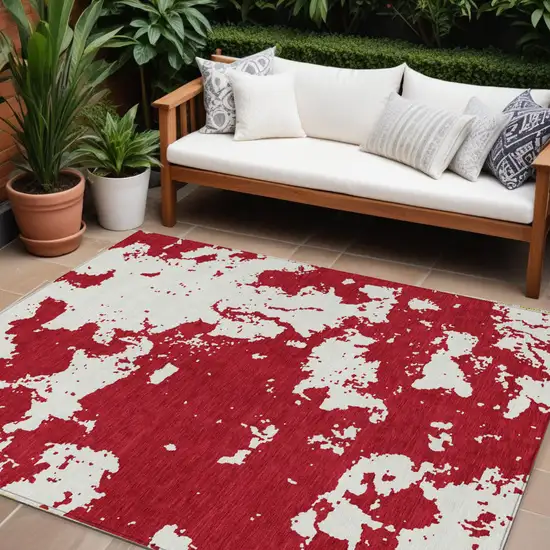 Red And Ivory Abstract Washable Indoor Outdoor Area Rug Photo 1