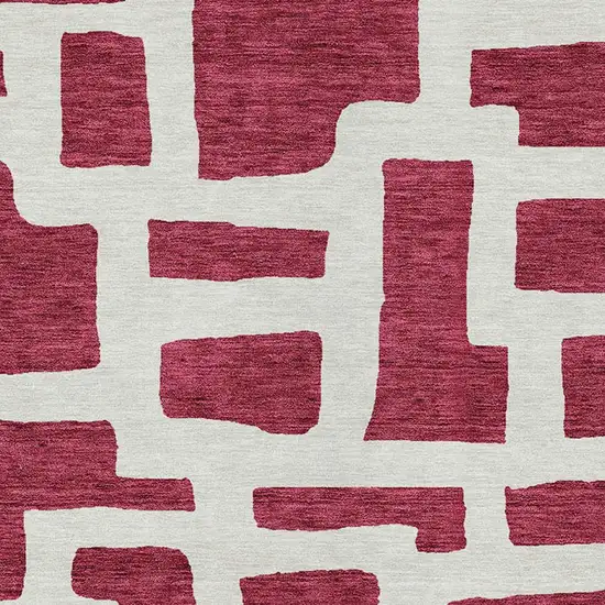 Red And Ivory Abstract Washable Indoor Outdoor Area Rug Photo 6