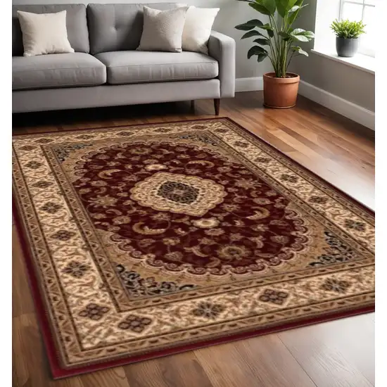Red and Beige Floral Medallion Power Loom Area Rug Photo 1