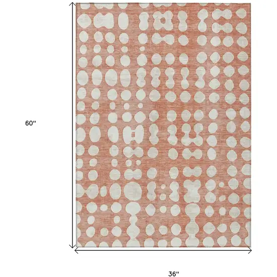 Salmon And Ivory Abstract Washable Indoor Outdoor Area Rug Photo 3