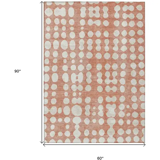 Salmon And Ivory Abstract Washable Indoor Outdoor Area Rug Photo 3