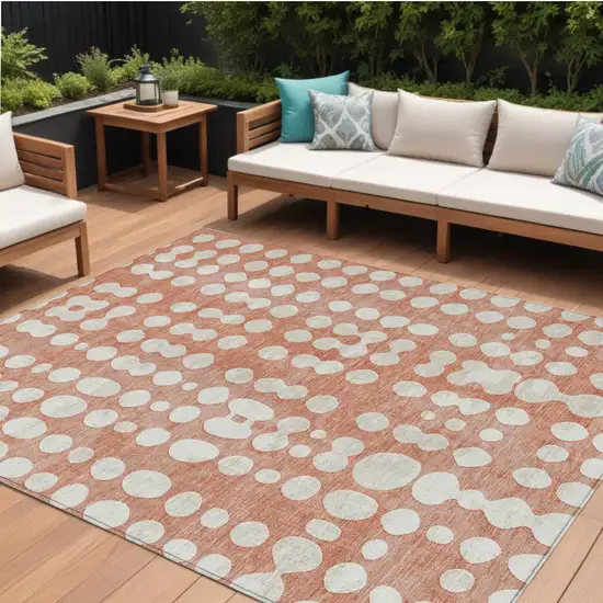 Salmon And Ivory Abstract Washable Indoor Outdoor Area Rug Photo 1