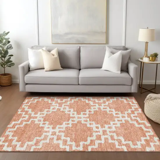 Salmon And Ivory Geometric Washable Indoor Outdoor Area Rug Photo 9