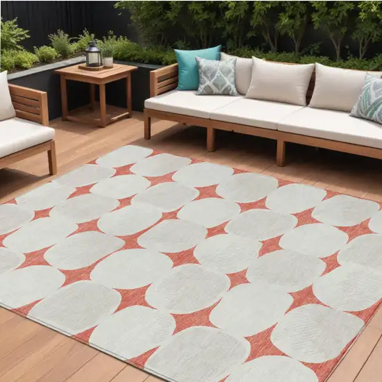 Salmon Beige And Ivory Abstract Washable Indoor Outdoor Area Rug Photo 1