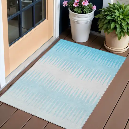 Sky Blue And Gray Striped Washable Indoor Outdoor Area Rug Photo 1