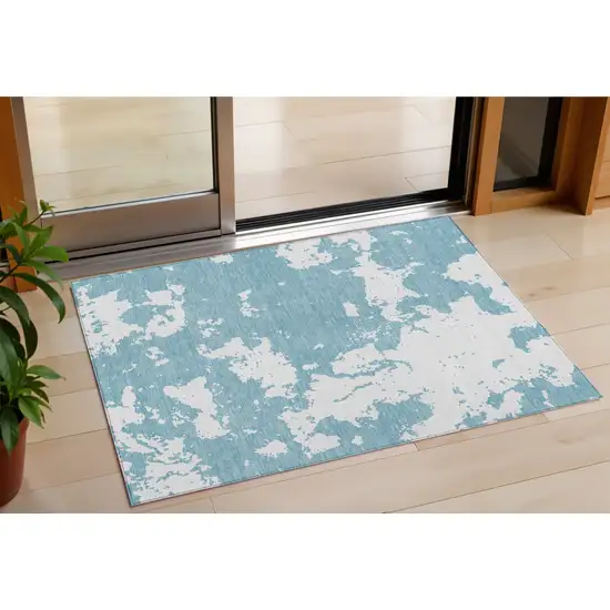 Sky Blue And Ivory Abstract Washable Indoor Outdoor Area Rug Photo 1