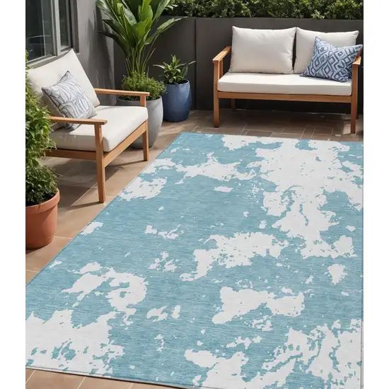 Sky Blue And Ivory Abstract Washable Indoor Outdoor Area Rug Photo 1