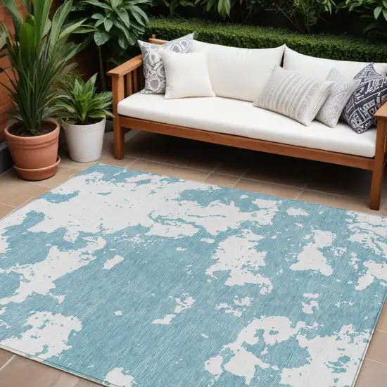 Sky Blue And Ivory Abstract Washable Indoor Outdoor Area Rug Photo 1