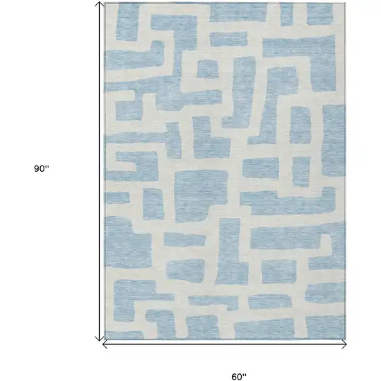 Sky Blue And Ivory Abstract Washable Indoor Outdoor Area Rug Photo 3