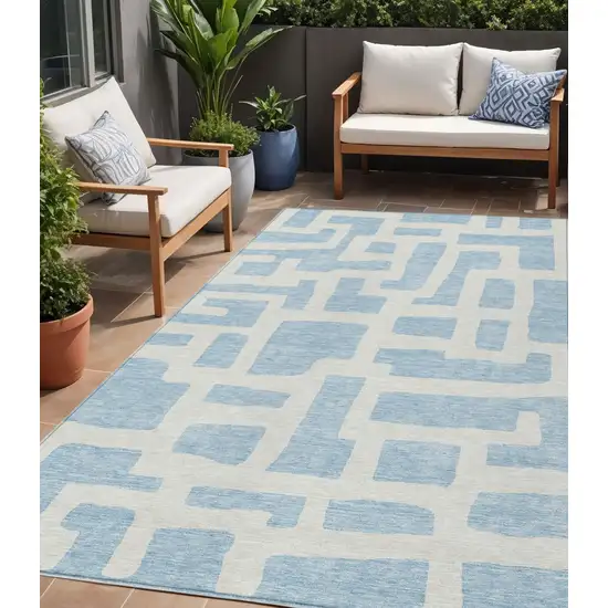 Sky Blue And Ivory Abstract Washable Indoor Outdoor Area Rug Photo 1