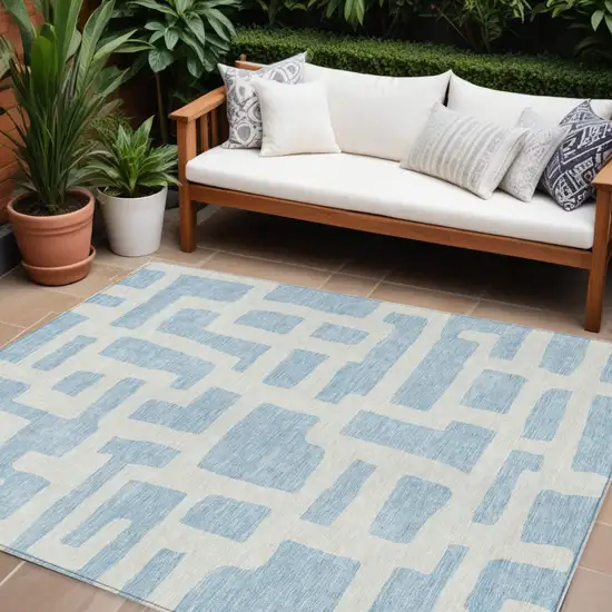Sky Blue And Ivory Abstract Washable Indoor Outdoor Area Rug Photo 1