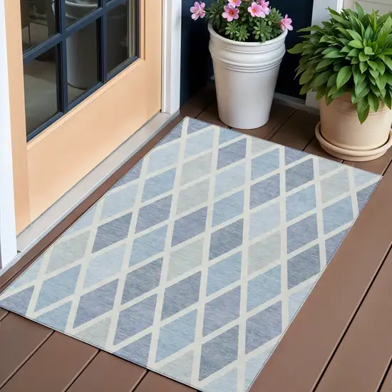 Sky Blue And Ivory Geometric Washable Indoor Outdoor Area Rug Photo 1