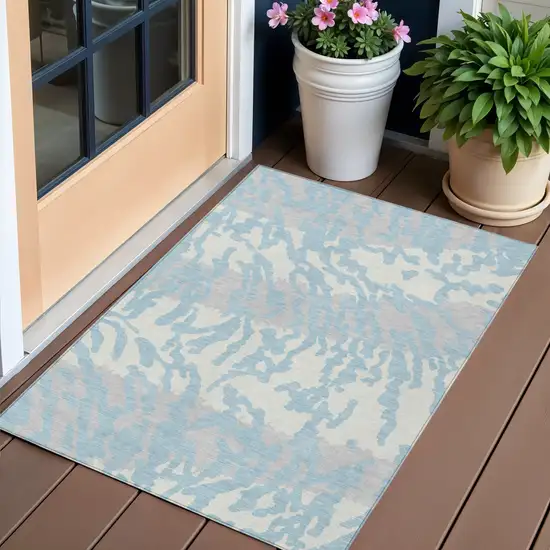Sky Blue Gray And Ivory Animal Print Washable Indoor Outdoor Area Rug Photo 1