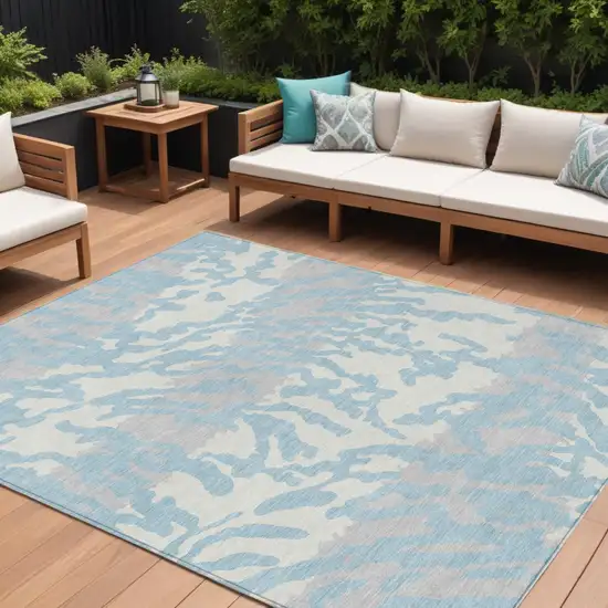 Sky Blue Gray And Ivory Animal Print Washable Indoor Outdoor Area Rug Photo 1