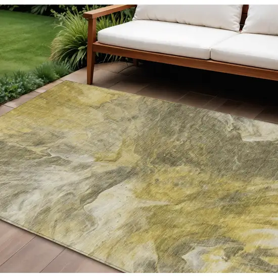 Taupe Beige And Ivory Abstract Washable Indoor Outdoor Area Rug Photo 1