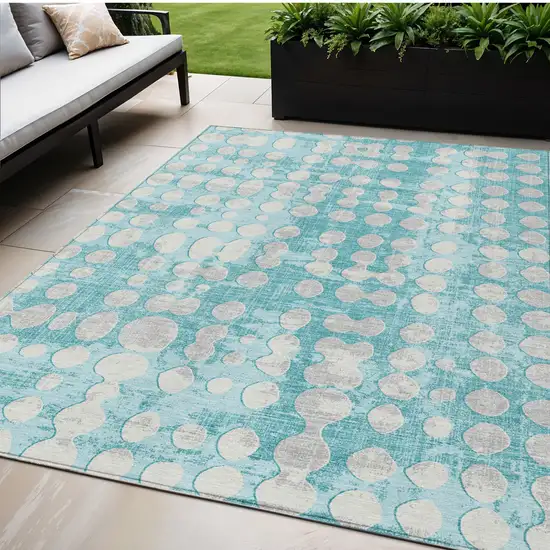 Teal Blue And Ivory Abstract Washable Indoor Outdoor Area Rug Photo 1