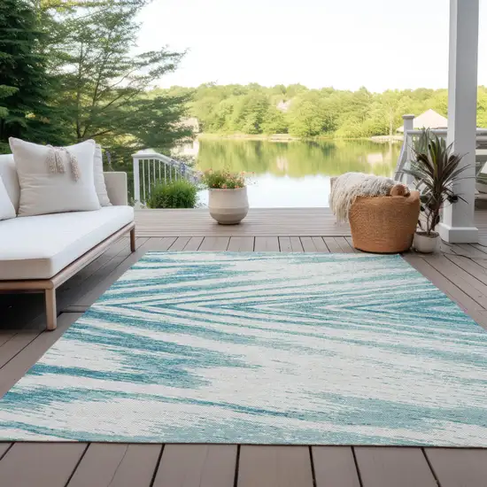 Teal Blue And Ivory Abstract Washable Indoor Outdoor Area Rug Photo 7