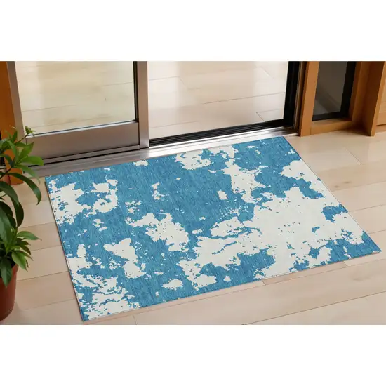 Teal Blue And Ivory Abstract Washable Indoor Outdoor Area Rug Photo 1