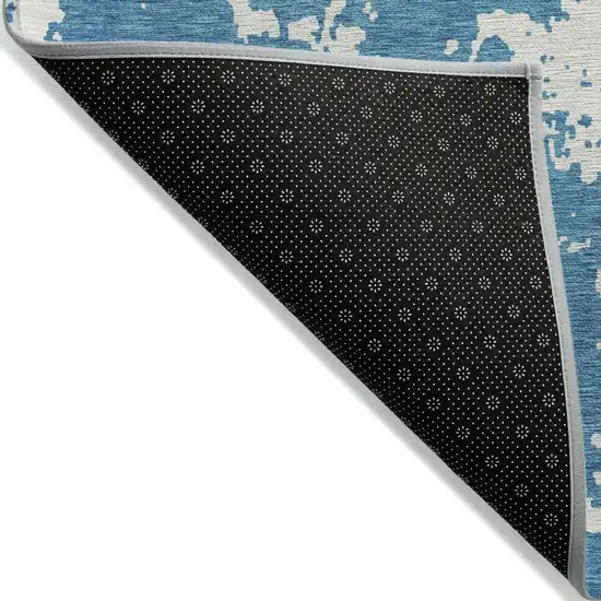Teal Blue And Ivory Abstract Washable Indoor Outdoor Area Rug Photo 4