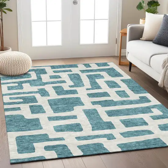 Teal Blue And Ivory Abstract Washable Indoor Outdoor Area Rug Photo 7