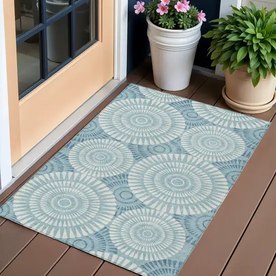 Teal Blue And Ivory Geometric Washable Indoor Outdoor Area Rug Photo 1
