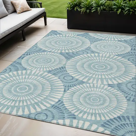 Teal Blue And Ivory Geometric Washable Indoor Outdoor Area Rug Photo 1