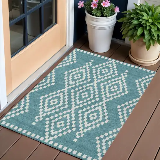 Teal Blue And Ivory Geometric Washable Indoor Outdoor Area Rug Photo 1