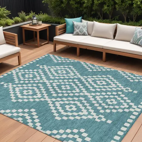 Teal Blue And Ivory Geometric Washable Indoor Outdoor Area Rug Photo 1