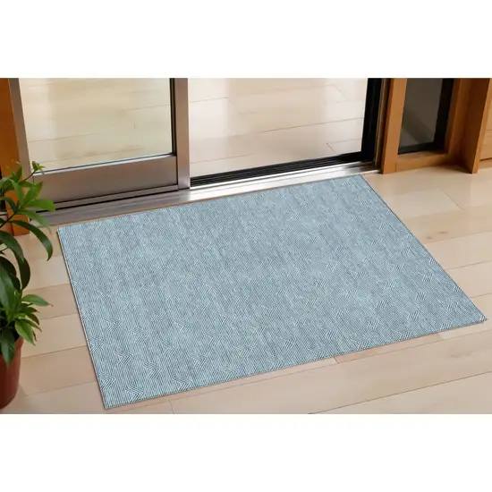 Teal Blue And Ivory Geometric Washable Indoor Outdoor Area Rug Photo 1
