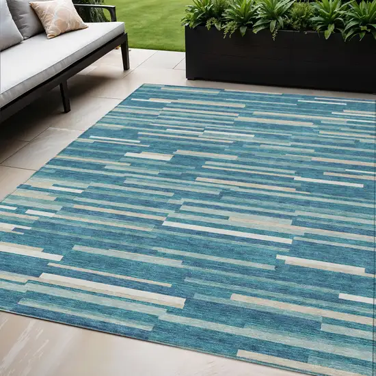 Teal Blue And Ivory Striped Washable Indoor Outdoor Area Rug Photo 1