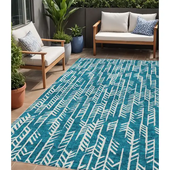Teal Blue And Ivory Tribal Washable Indoor Outdoor Area Rug Photo 1