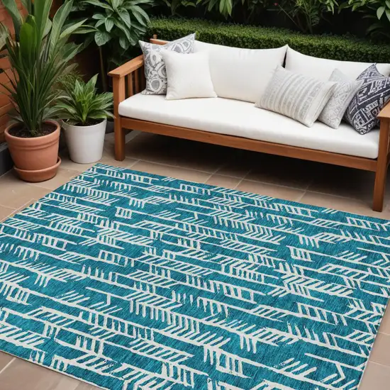 Teal Blue And Ivory Tribal Washable Indoor Outdoor Area Rug Photo 1