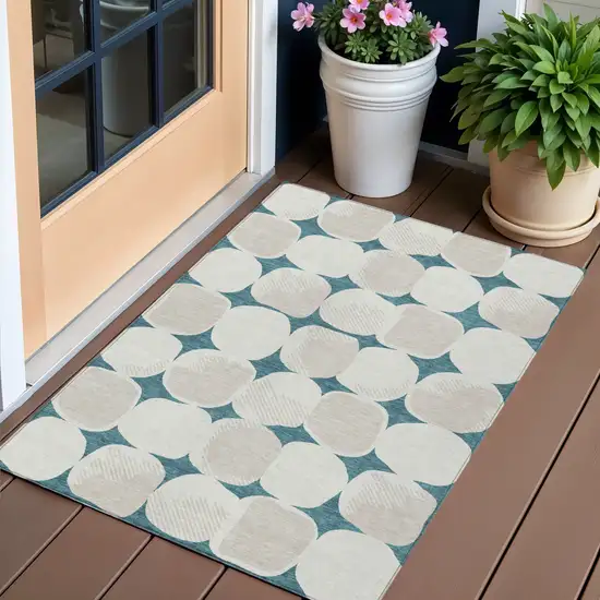 Teal Blue Beige And Ivory Abstract Washable Indoor Outdoor Area Rug Photo 1
