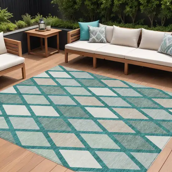 Teal Blue Ivory And Beige Geometric Washable Indoor Outdoor Area Rug Photo 1